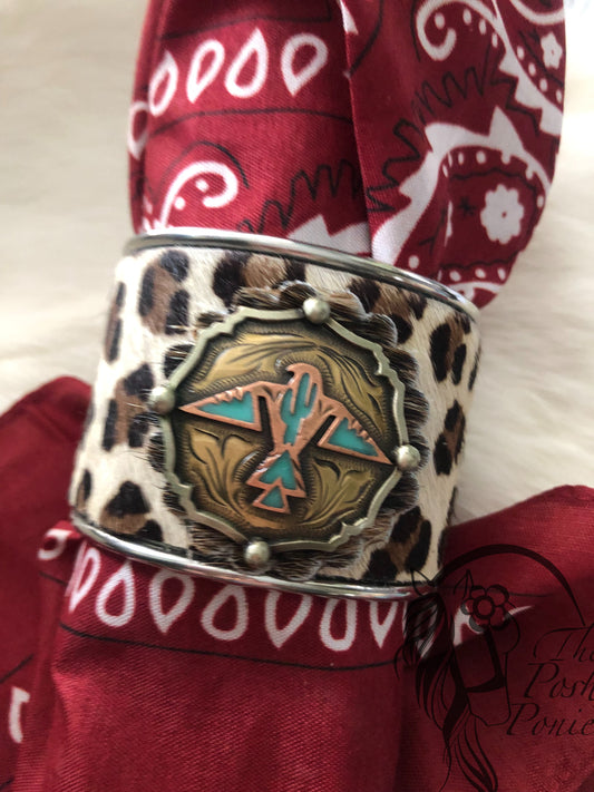 Cuff Metal cheetah hair on hide with Thunderbird handmade center concho