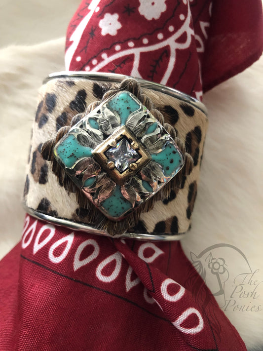 Cuff Metal 2" with cheetah hair on hide turquoise square concho